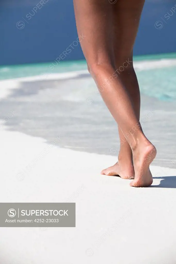 Woman beach legs