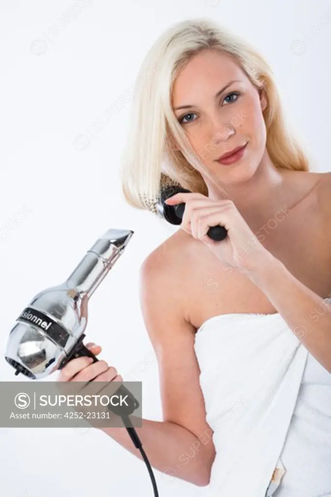 Woman hair brushing