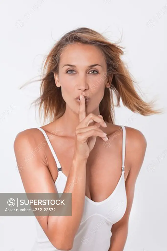 Woman silence gesture