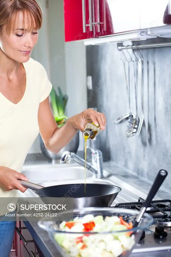 Woman kitchen vegetables
