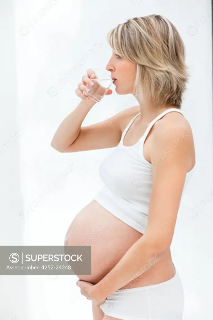 Pregnant woman glass of water
