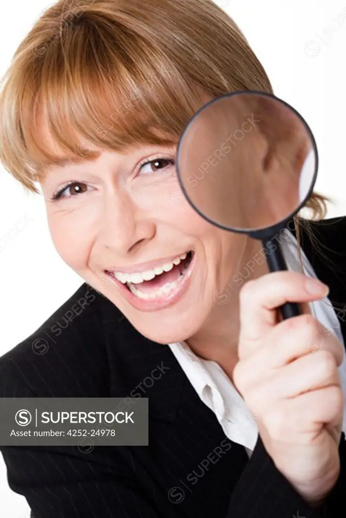 Woman magnifying glass