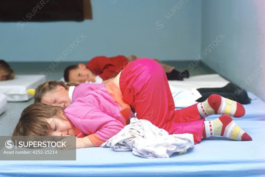 children inside sleeping girl group school boy sleeping nap