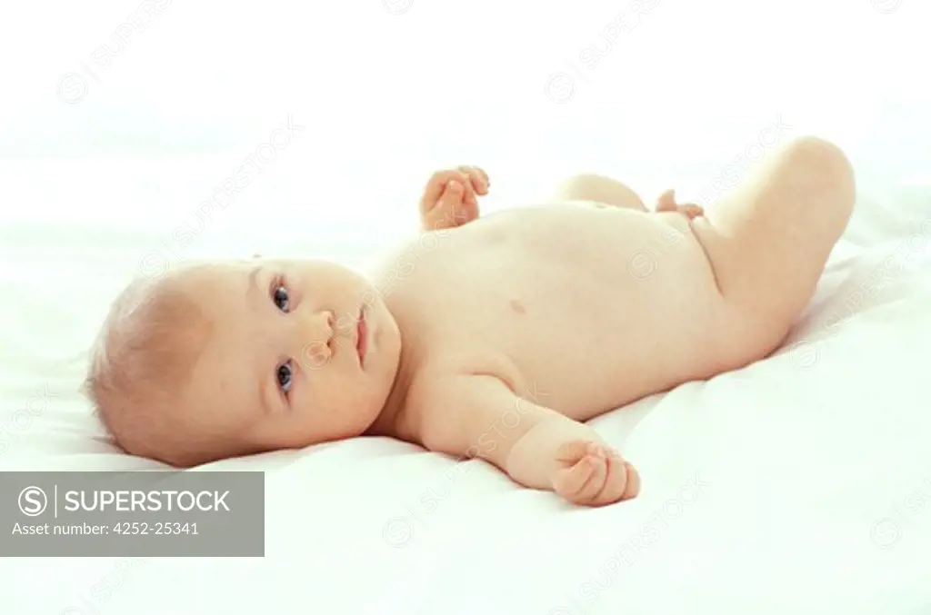 children inside boy baby nude skin relaxation lie down caressing bed