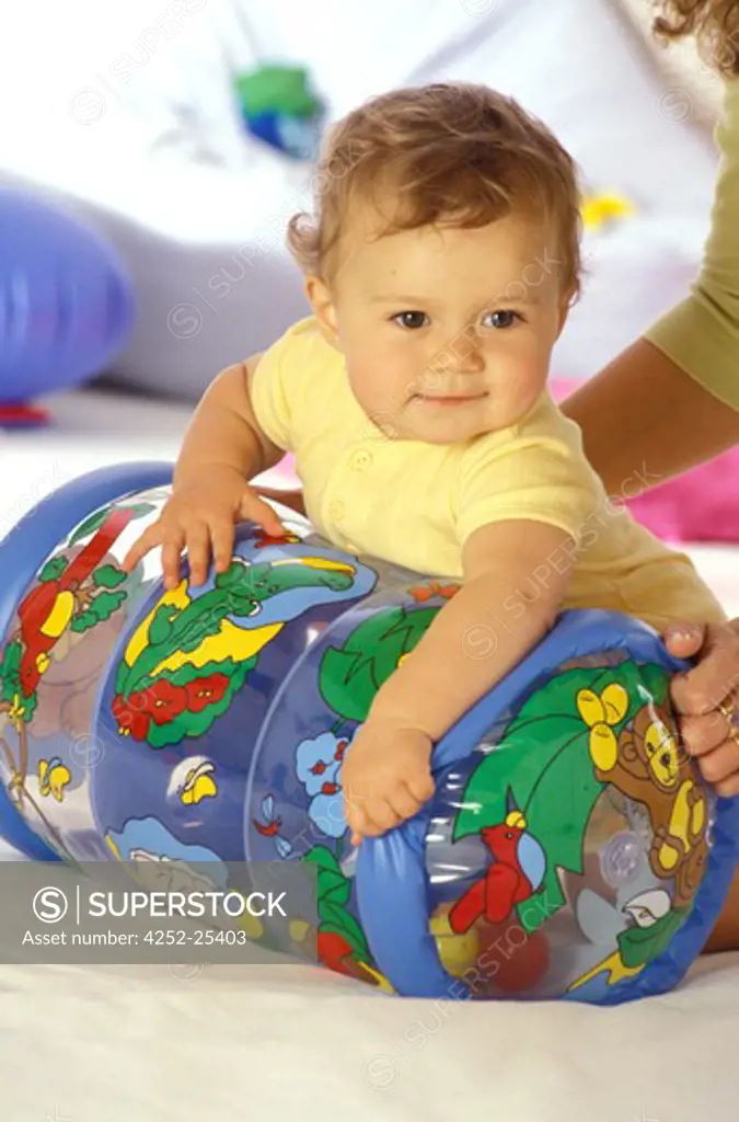 children inside boy play baby toy mother woman