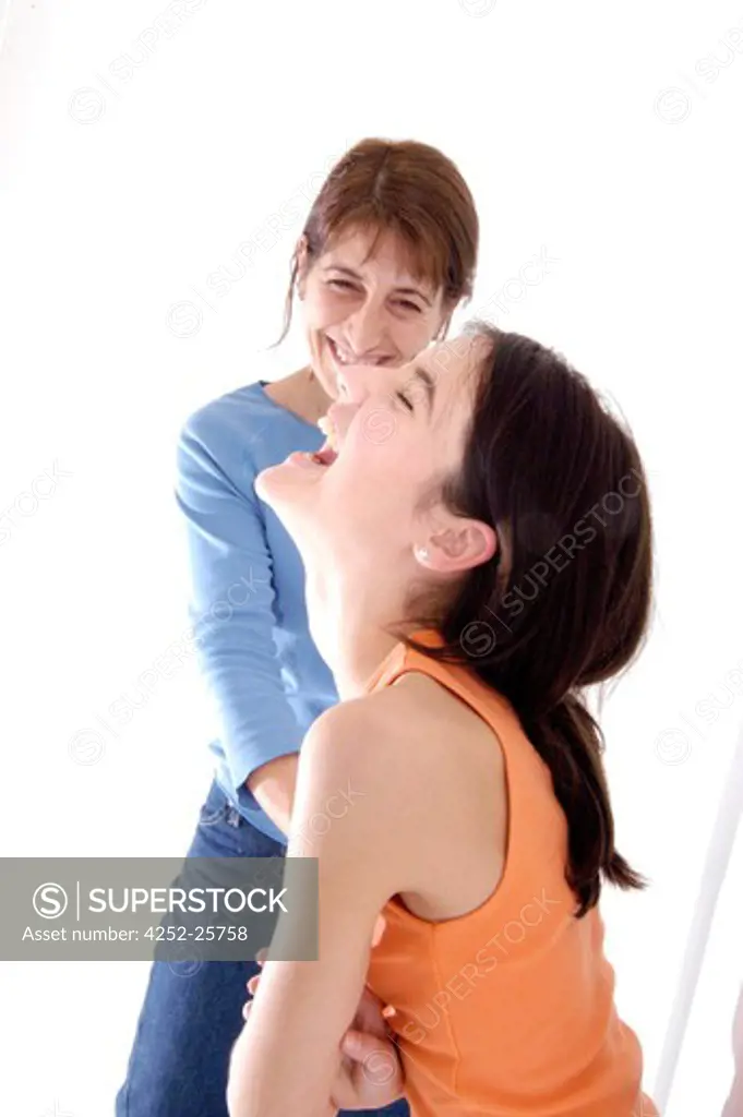 Mother and daughter, laughing