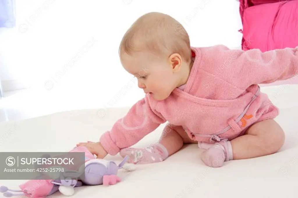 Baby with a toy