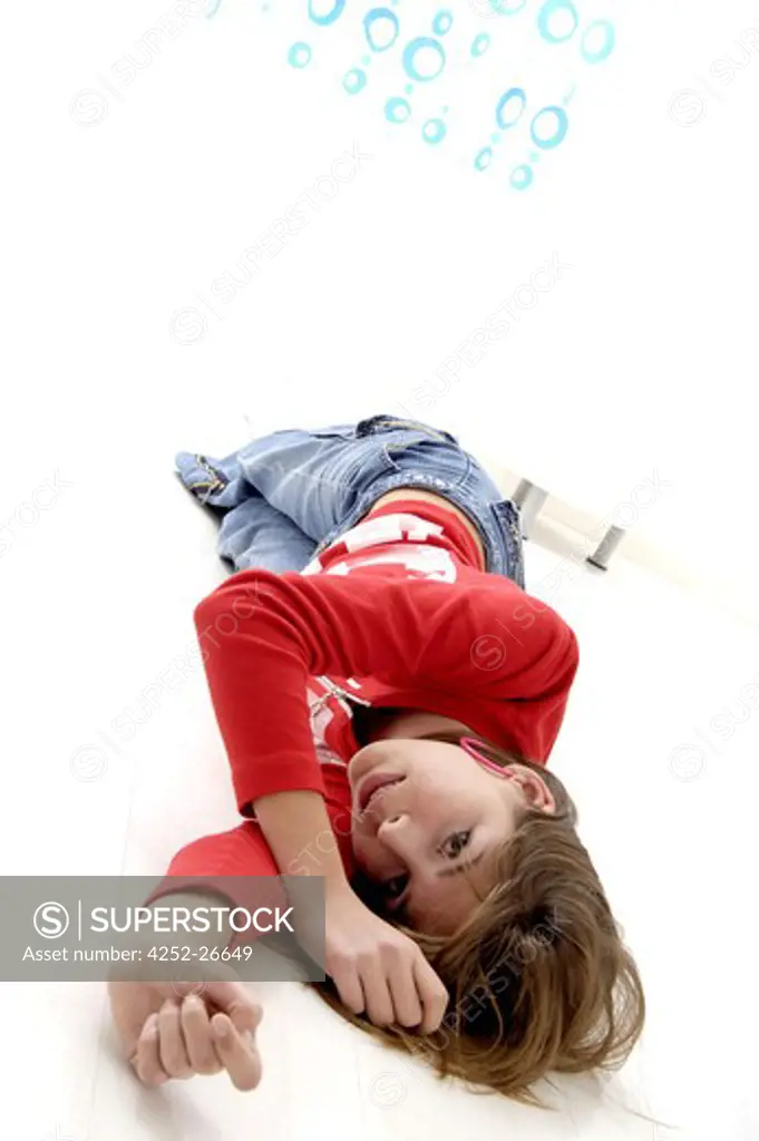 Girl lying on the ground