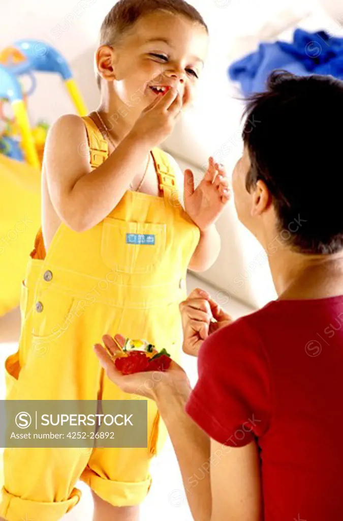 Child eating candies