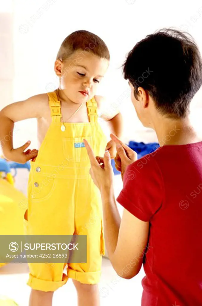Child being scolded by mother