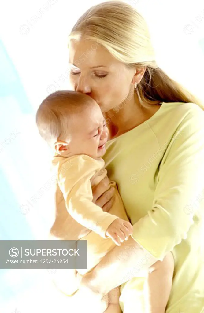 Woman comforting baby
