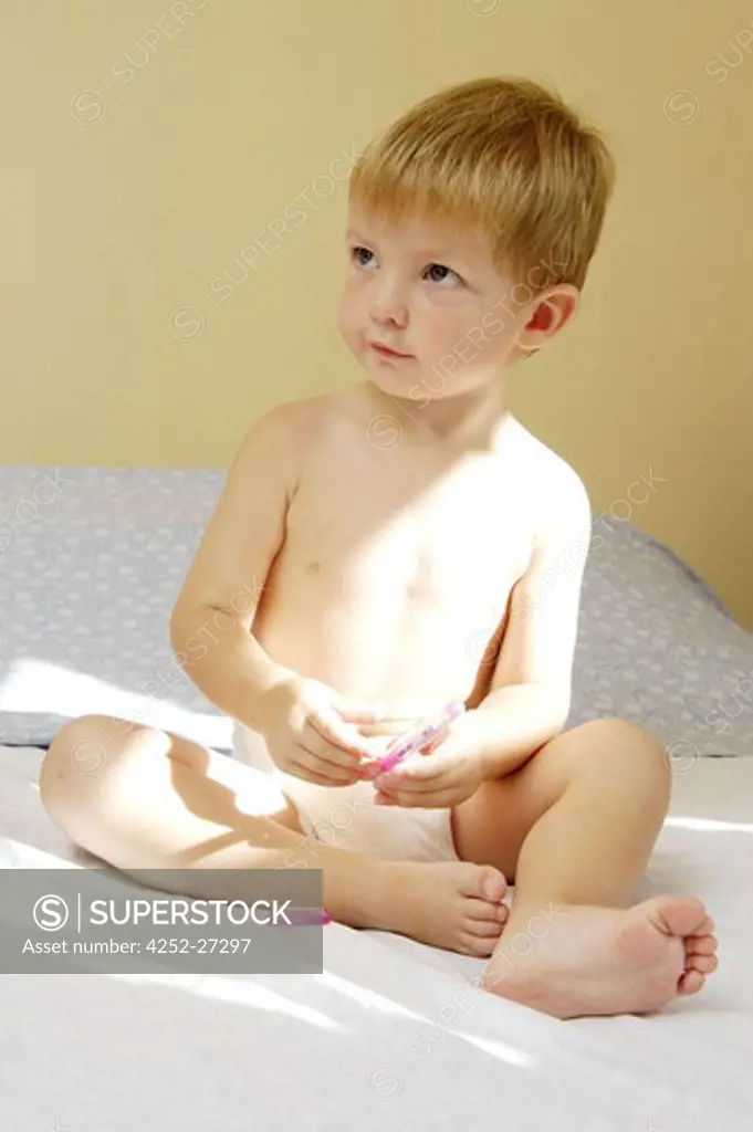 Little boy sitting
