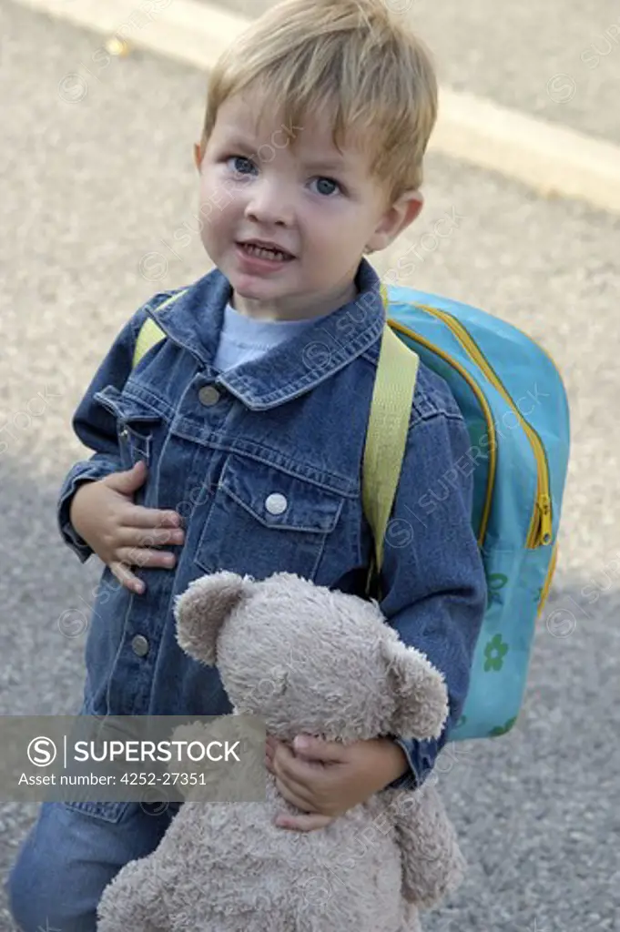 Little boy going to school