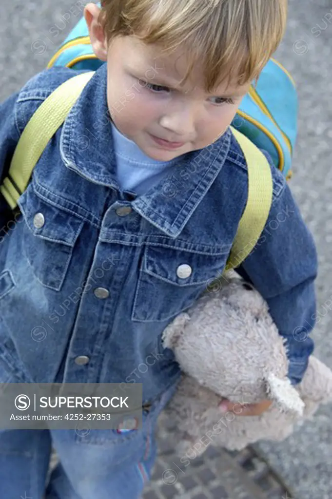 Little boy going to school