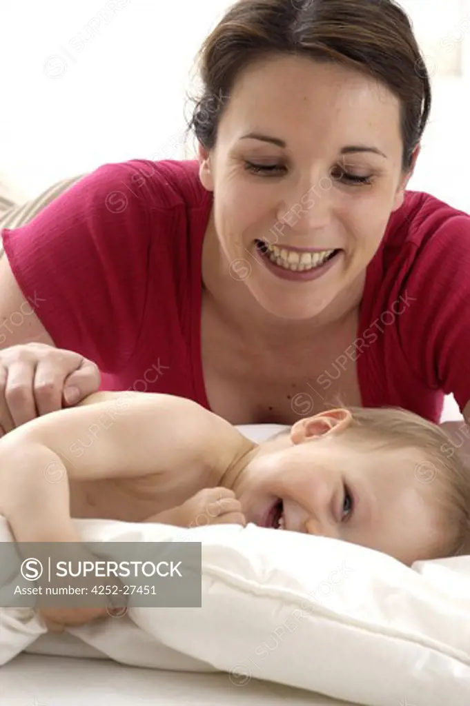 Woman and baby laugh