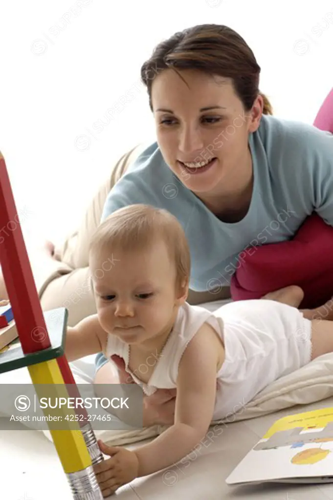Woman baby playing