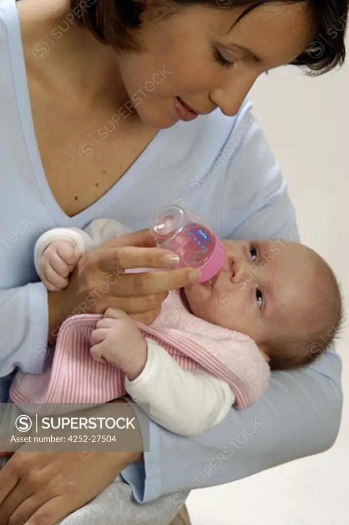 Woman feeding her baby