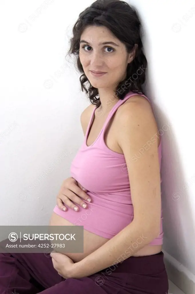 Sitting pregnant woman