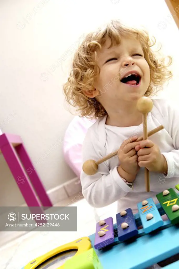 Little girl xylophone toy