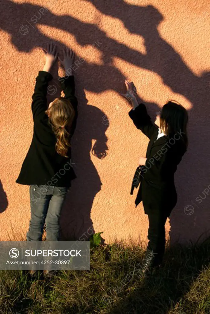 Little girls shadow wall