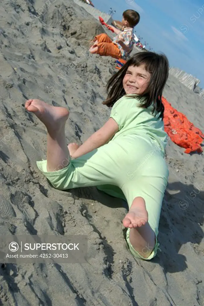 Little girl playing sand