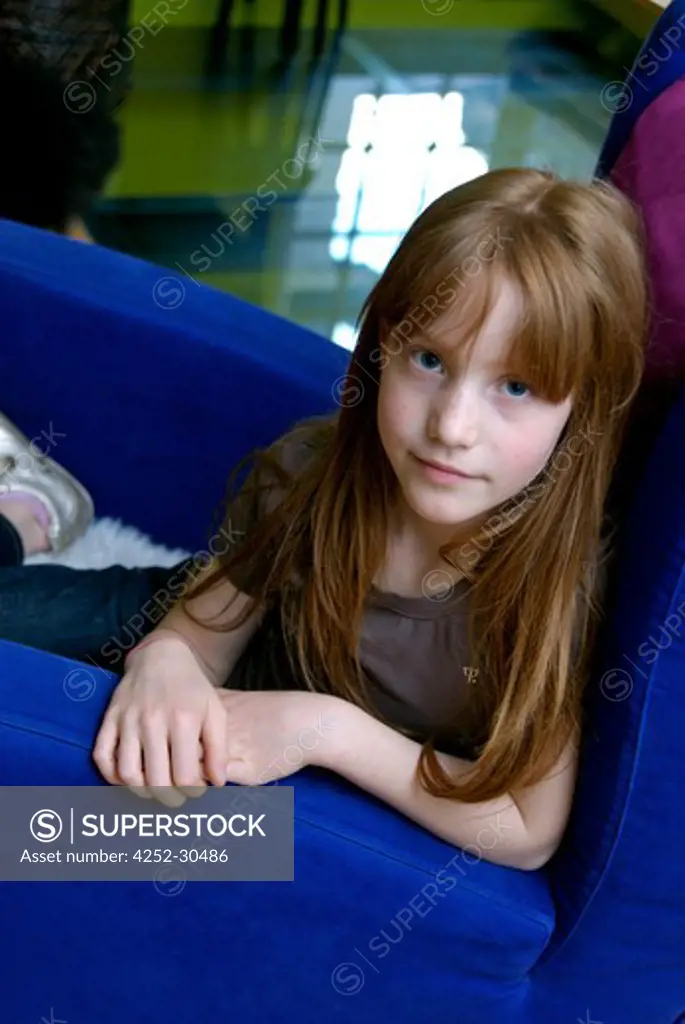 Girl armchair portrait