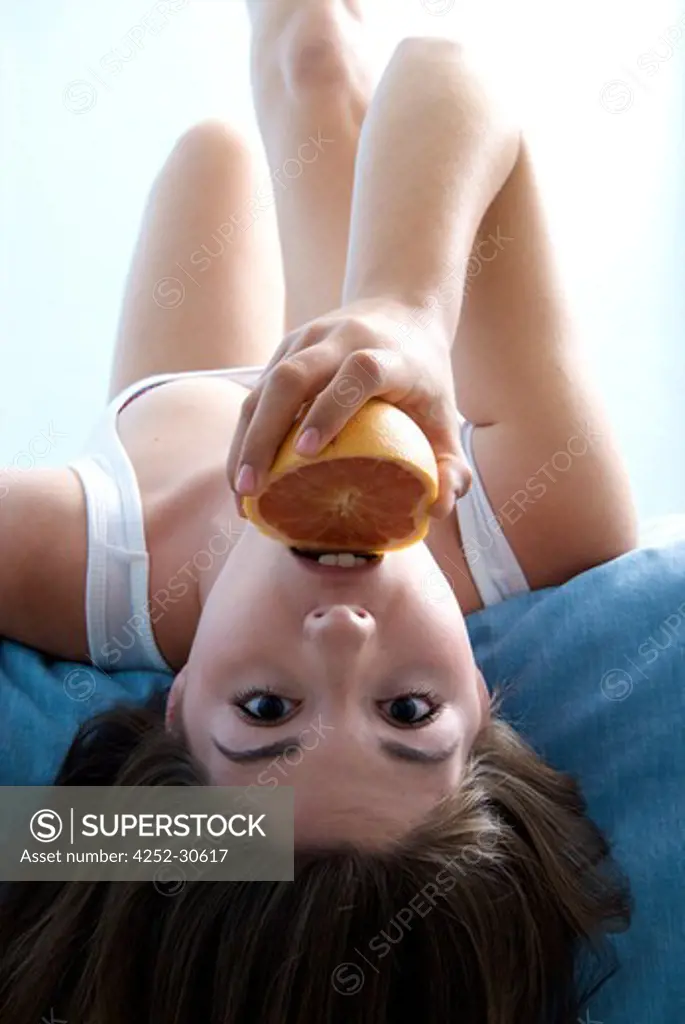 Teenage girl grapefruit