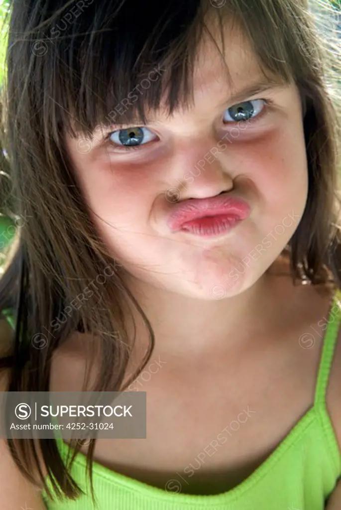Little girl funny face