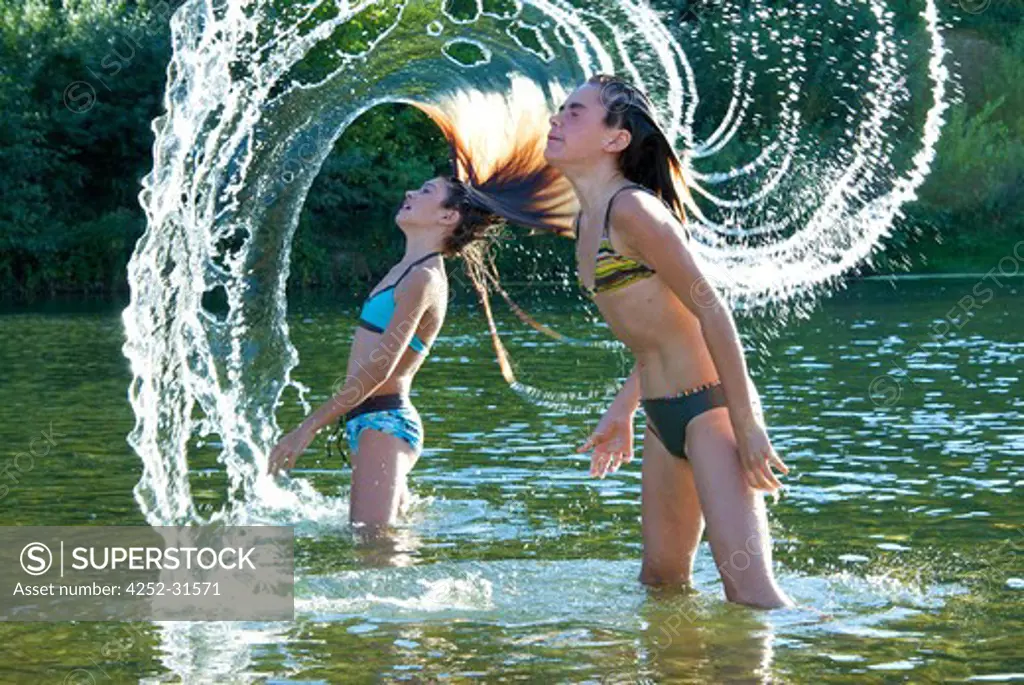 Teenage girl summer river