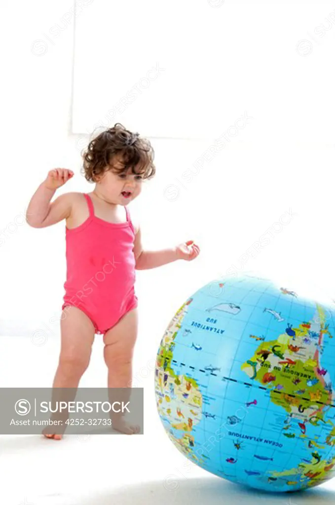 Baby globe playing
