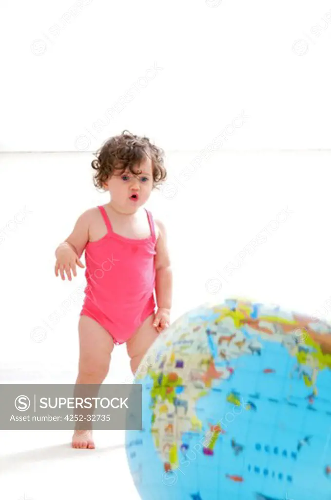 Baby globe playing