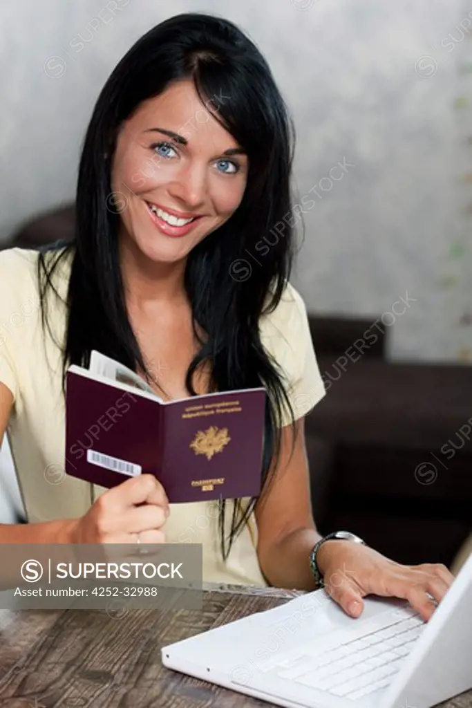 Woman computer passport