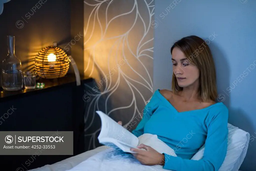 Woman bed reading