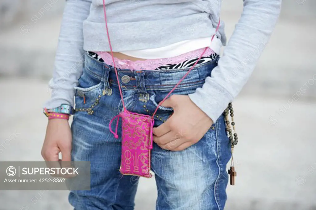 Teenage girl low belt rosary