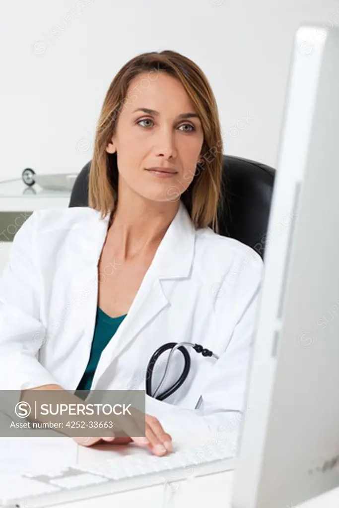 Woman physician computer