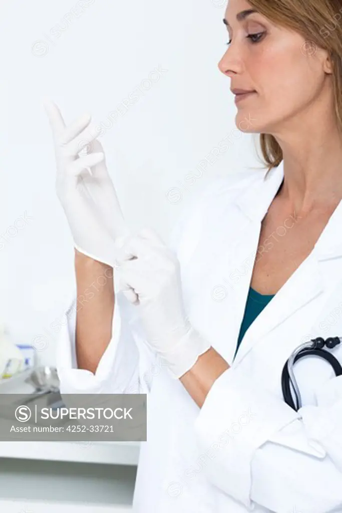 Surgeon woman gloves