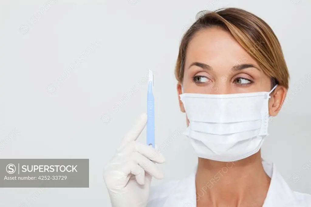 Surgeon woman scalpel