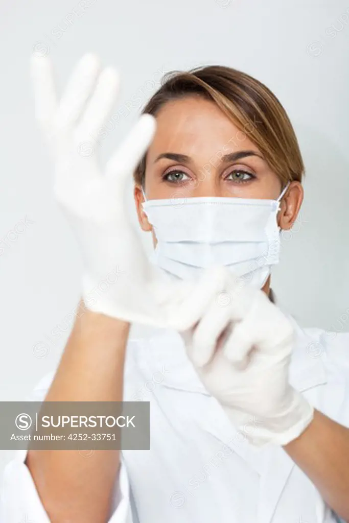 Surgeon woman gloves