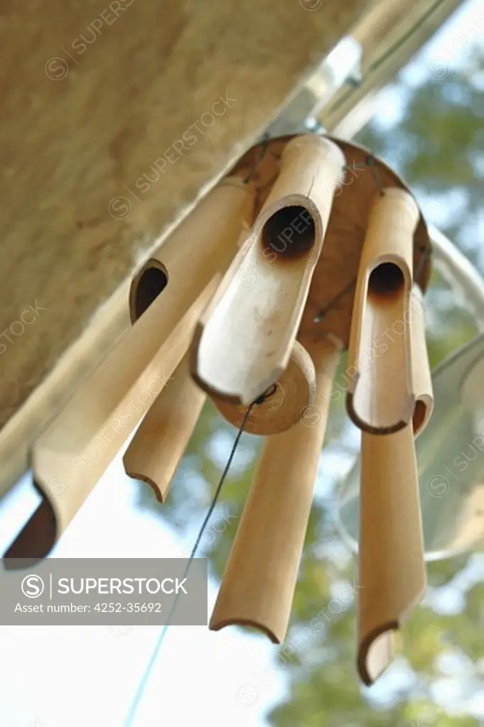 Bamboo chimes hanging on a door