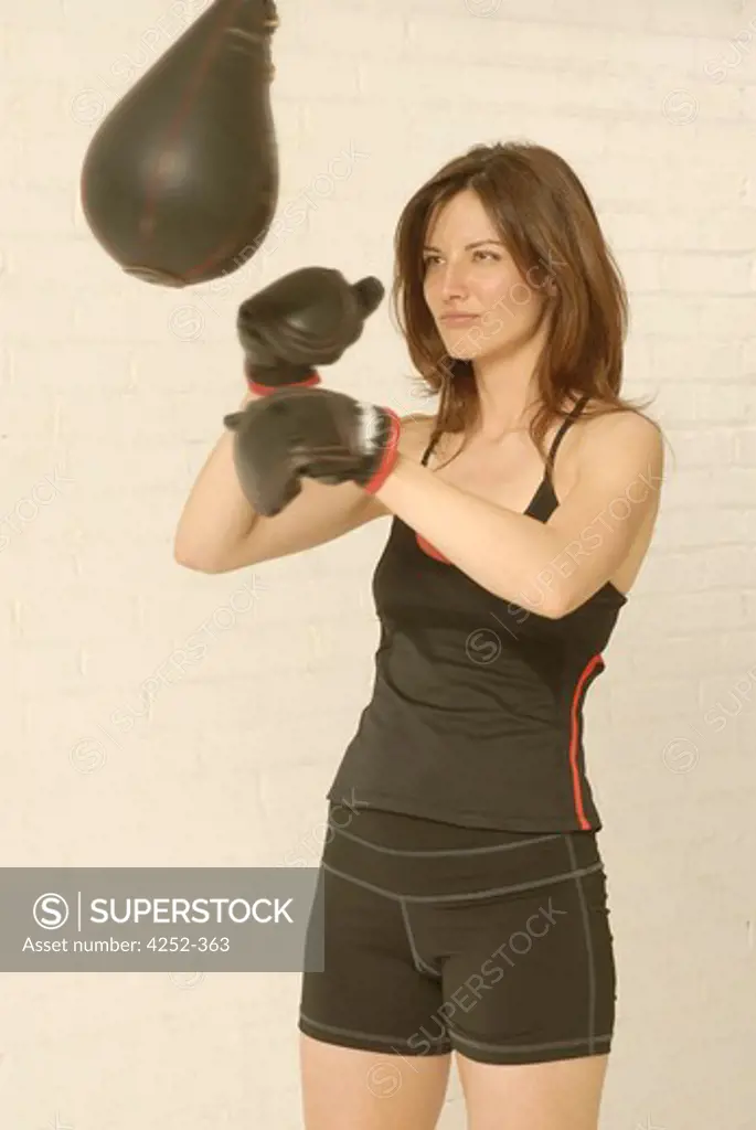 Woman punching-ball