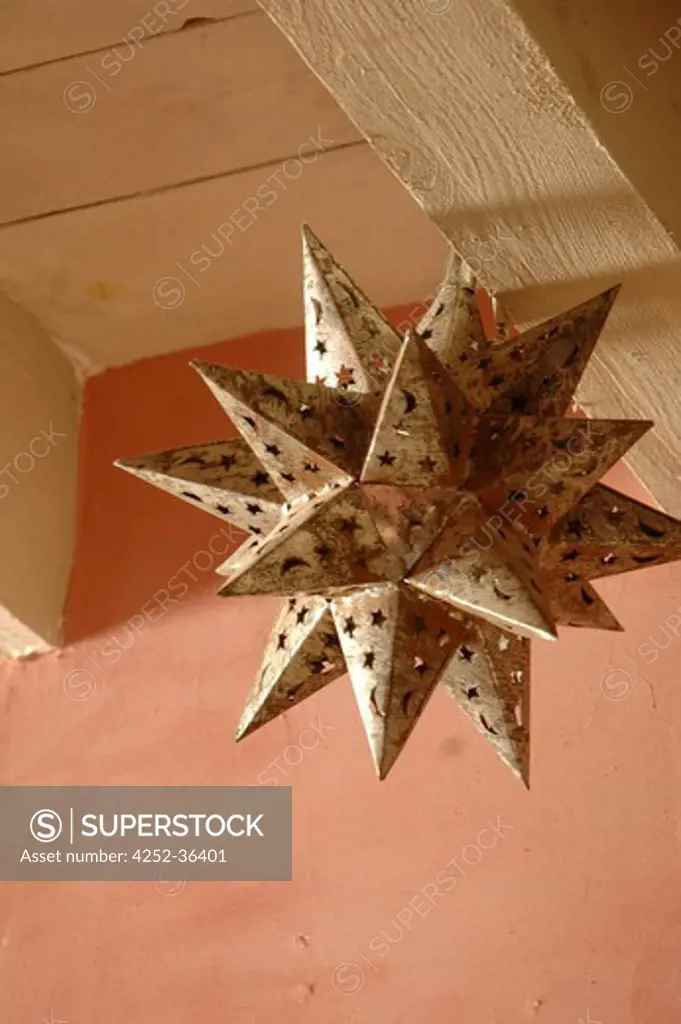 Oriental star shaped lantern hanging on the ceiling