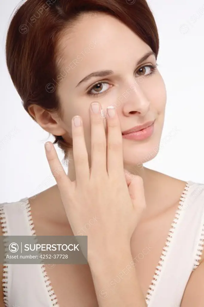 Woman face moisturizing
