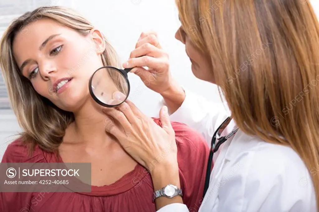 Woman beauty spot dermatologist