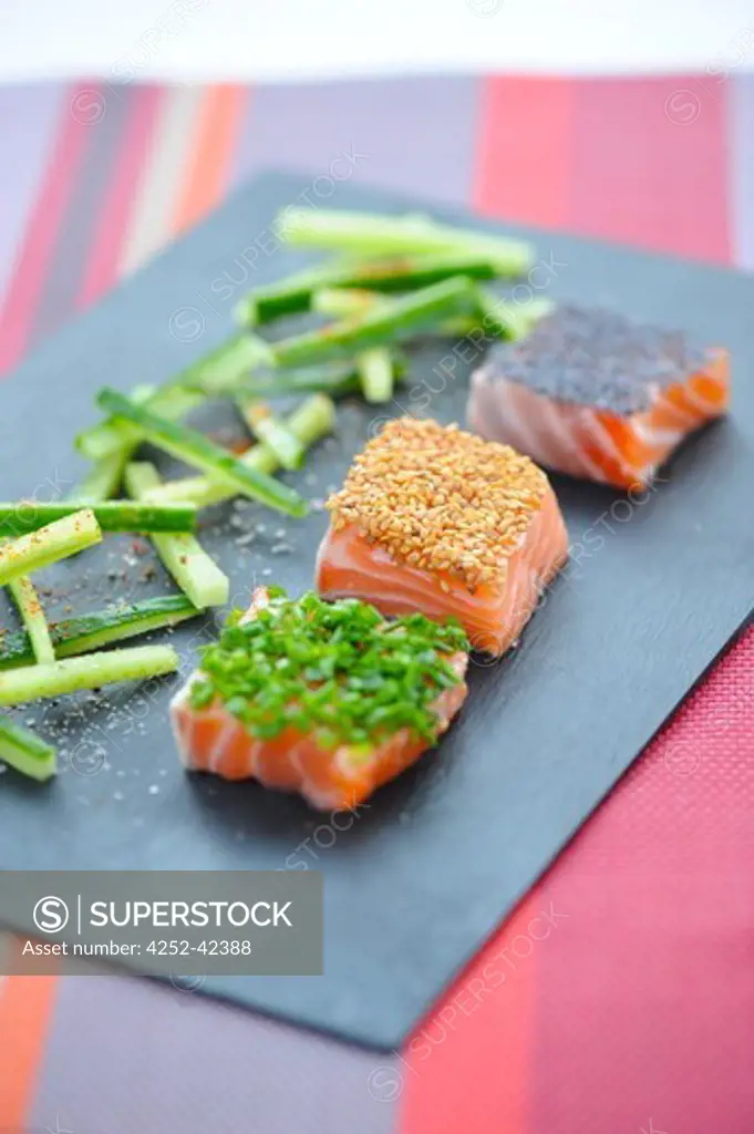 Raw salmon with herbs and seeds