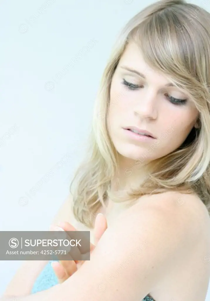 Woman moisturizing cream