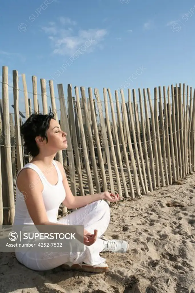 Woman beach and yoga