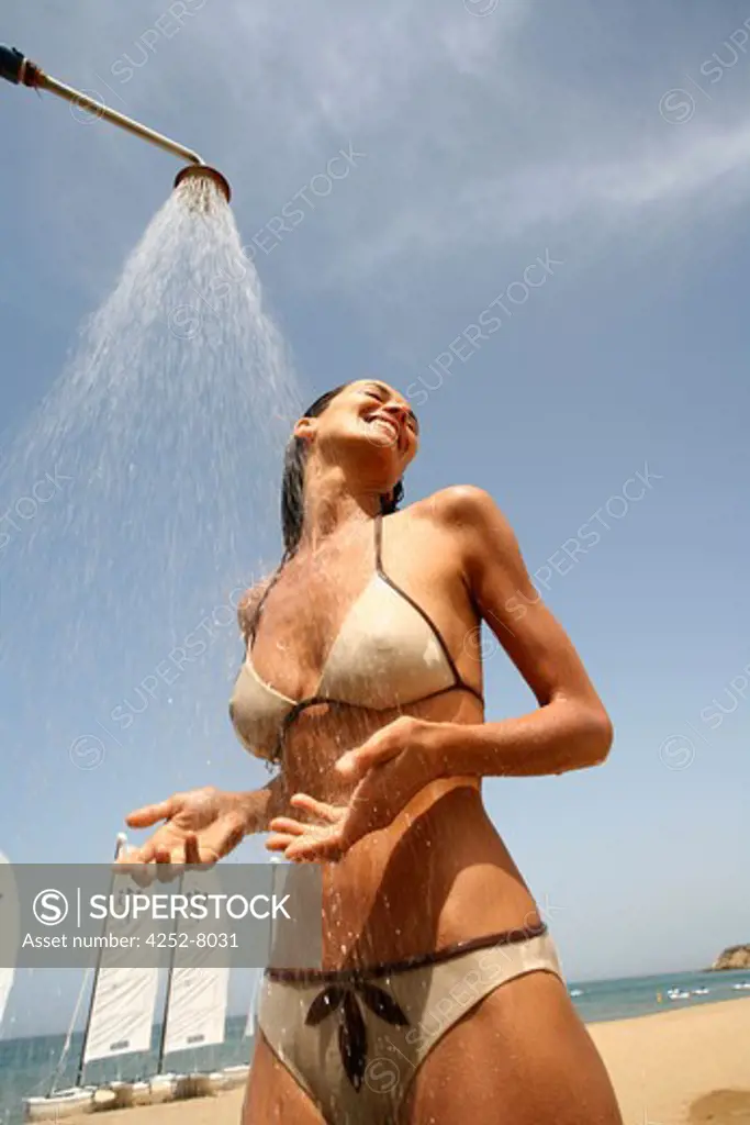 Woman shower and beach