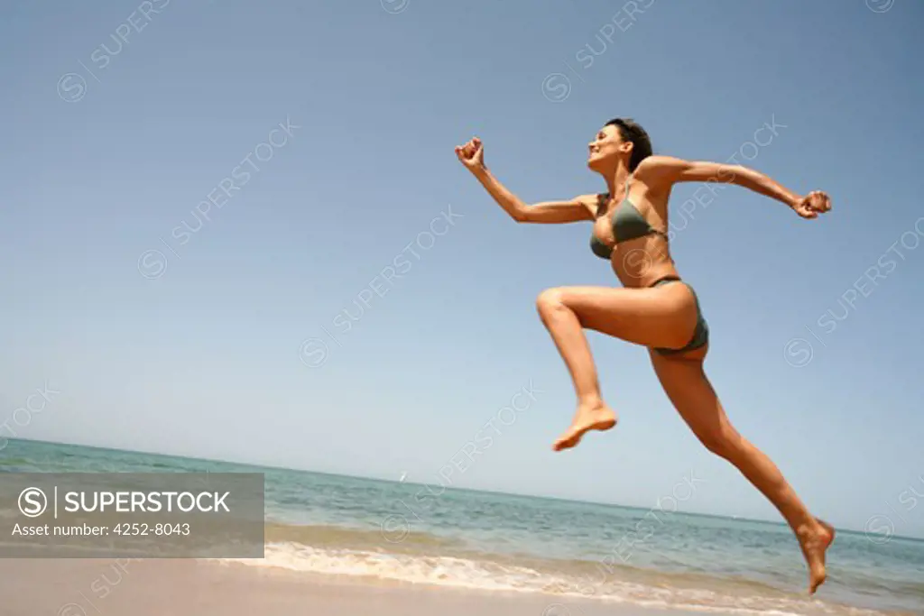 Woman beach and energy