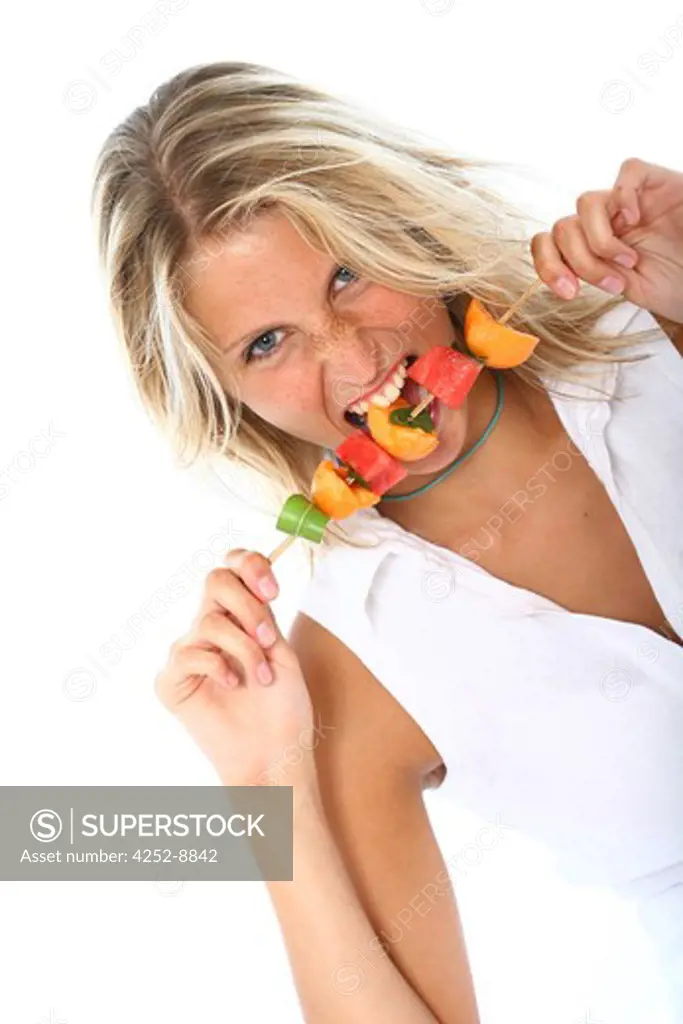 Woman fruits brochette