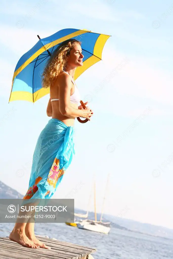 Woman beach umbrella
